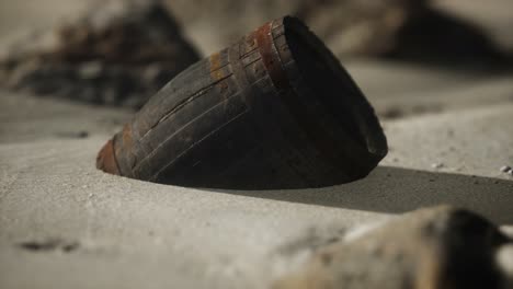 Old-wooden-barrel-on-the-beach